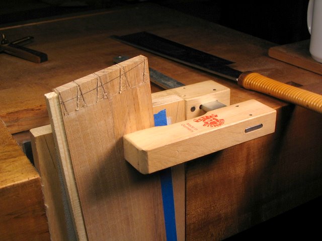 Sawing Fore Hand Side of Tails Close-Up